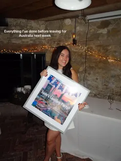 Group of friends laughing at a farewell party, celebrating new beginnings and moving to Australia.