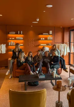 Team enjoying bespoke wellness experiences at OREN in Cardiff, showcasing corporate wellness initiatives.