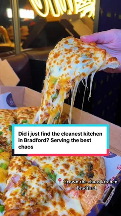 Clean and inviting interior of Crown Chaos Kitchen in Bradford, showcasing delicious halal food options.