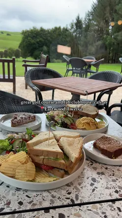 Visitors enjoying golf and food at Eastwood Twelve, a scenic 12-hole course in Newton Mearns, East Renfrewshire.