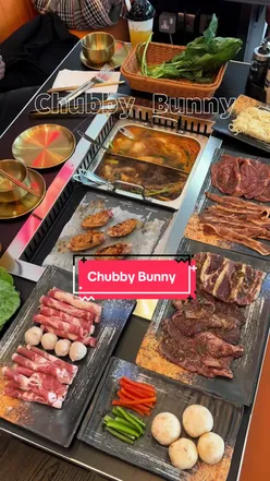 Chubby Bunny hot pot and BBQ experience with fresh meats and seafood for winter dining in London.