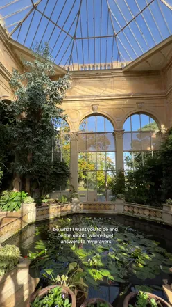 Visitors enjoying autumn strolls at Castle Ashby Gardens, surrounded by vibrant fall foliage and the historic orangery.