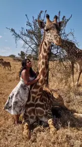 Outfits worn on safari in Kenya and Tanzania, showcasing travel style amidst stunning landscapes.