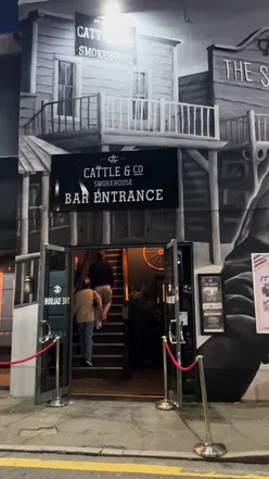 Delicious wings at Cattle&Co Smokehouse launch event in Swansea, featuring smiles and great food with Uber Eats.