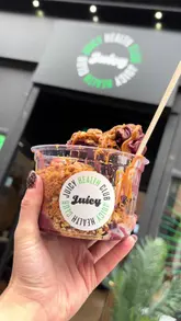 Delicious wraps and smoothies at Juicy UK, showcasing vibrant food and a fun dining experience in Glasgow.
