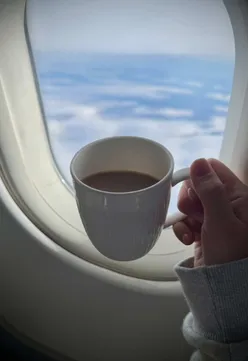 Coffee lovers enjoying a cozy moment at a British Airways café.