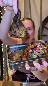 Diners enjoying vibrant Indian dishes at Mowgli Street Food, Cheshire Oaks restaurant.