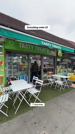 Delicious street food highlights in East London featuring colorful tasty treats and vibrant atmosphere.