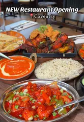 New Covered Wagon restaurant in Coventry showcasing Indian mixed grill dishes and a vibrant interior.