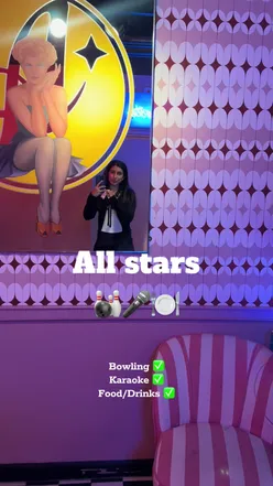 Group enjoying bowling, burgers, and karaoke at All Stars, London – fun vibes and friendly competition!
