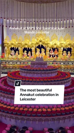 Annakut celebration with colorful dishes and grand displays at BAPS Swaminarayan Mandir, Leicester, after Diwali festivities.