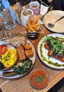 Vegan brunch spread at Mallow in London, featuring Full English, Tiramisu French Toast, and Earl Grey Lat-tea.