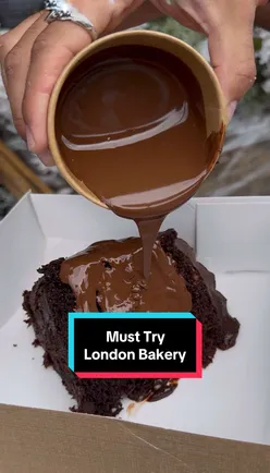 Delicious pastries and chocolates displayed at Greedy Cow Bakes, a charming bakery in Hackney, London.