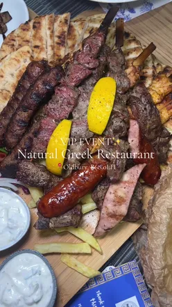 VIP event at Natural Greek Restaurant featuring authentic Greek dishes, drinks, and live entertainment in Oldbury.