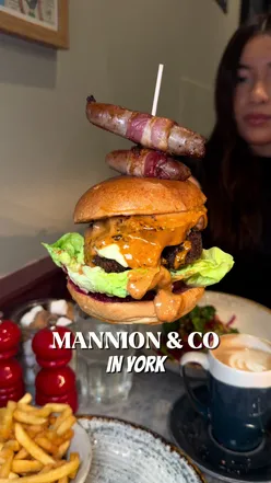 MANNION & CO, YORK 🍳  INVITE | If you love brunch, next-level sandwiches and seriously good baked goods, Mannions needs to be on your list. With cafés in both Helmsley and York, it’s always a win — and our visit last weekend was no exception. The festive burger was the dish that first caught our eye, so naturally George ordered it at 10am 😆 And honestly… it was just as outrageous as it looked.  Buttermilk fried chicken, cranberry sauce and all the festive extras — there was a lot going on, but it worked perfectly. It didn’t stand a chance and was gone in about five minutes. To balance things out, we went a little lighter. The Turkish eggs were some of the best we’ve had, with a gorgeous harissa yoghurt, chickpeas and loads of delicious additions. An easy re-order next time. As always, the staff were so lovely and the food was unreal — every visit delivers amazing sandwich creations, top-quality ingredients and proper comfort food done right. We’ll never stop going back 🤍