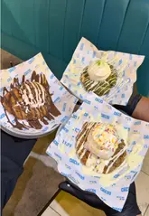 A fast-paced, high-energy food reel showcasing a variety of dishes from Chicos, including brisket smash burgers, loaded fries, mozzarella sticks, and a new dessert menu featuring cookies and tiramisu. The video uses quick cuts and close-up shots to emphasize the texture and appeal of the food.