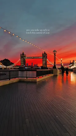 First sunrise of 2026 over Tower Bridge, London, celebrating the New Year with vibrant colors and a stunning view.