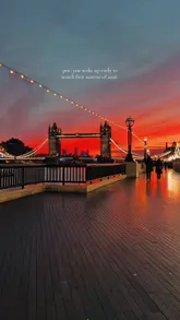 First sunrise of 2026 over Tower Bridge, London, celebrating the New Year with vibrant colors and a stunning view.