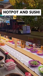 A video review of Seoul & Tokyo in Manchester, showcasing their hotpot and sushi conveyor belt dining experience. The creator highlights the variety of ingredients available, the unique delivery system using toy trucks, and specific premium items like A5 Wagyu and king lobster tail.