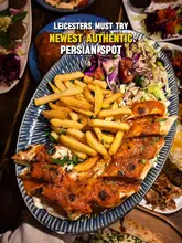 A montage-style promotional video for a Persian restaurant in Leicester, featuring close-up shots of various dishes, including kebabs, rice, dips, and desserts, interspersed with shots of the restaurant's interior.