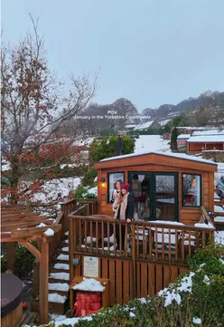 Snowy Yorkshire countryside near Bolton Abbey, showcasing Howgill Lodge and scenic walking trails.