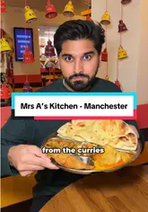 A fast-paced, informative review of Mrs A's Kitchen in Eccles, Manchester, highlighting its Bangladeshi street food menu and culturally-themed interior. The creator walks through the menu options, shows the food being served, and provides a taste test.