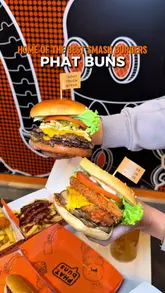 A promotional video for Phat Buns featuring a variety of their smash burgers, loaded fries, and drinks. The video uses quick cuts and upbeat music to showcase the menu items and the restaurant's interior branding.