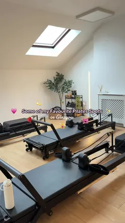 Pilates class in Glasgow, showcasing strength and mindfulness in a calming environment. Promoting wellness and self-care.
