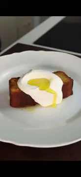 A recipe video demonstrating how to make an olive oil, yuzu, and orange cake. The creator walks through the steps of zesting, mixing, and baking, resulting in a moist, citrusy dessert.