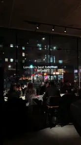 A quick-cut montage showcasing various dishes from different kitchens at Arcade Food Hall in London, including burgers, ramen, and Thai curries.