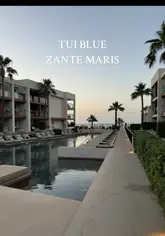 A fast-paced travel montage showcasing a resort in Zakynthos, Greece, featuring clips of the pool, beach, sea caves, cocktails, and local food.