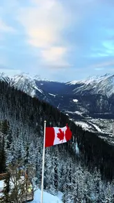 Snow-covered landscapes in Banff, Whistler, and Vancouver showcasing Canada's enchanting winter beauty.