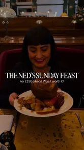 A detailed review of the 'Ned's Feast' Sunday lunch buffet at The Ned in London. The creator walks viewers through the extensive food offerings, including lobster, oysters, roast meats, and a dessert station, while providing commentary on the quality, atmosphere, and overall value of the experience.