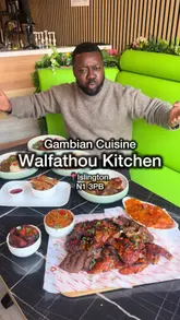 Gambian dishes served at Walfathou Kitchen in N1 3PB, featuring jollof rice and vibrant traditional flavors.