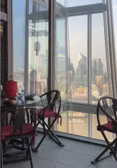A montage showcasing the dining experience at Hutong in The Shard, featuring views of the London skyline, cocktails, and various Chinese dishes.