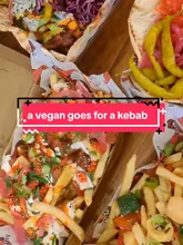 A short, energetic reel showcasing vegan kebabs, loaded fries, and spice bags from Seitanic at Abingdon Street Market in Blackpool. The video features close-up shots of the food, the venue interior, and the creator enjoying the meal, accompanied by upbeat music and informative text overlays.