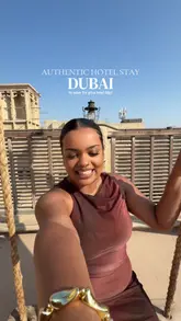 A travel vlog showcasing the Al Seef Heritage Hotel in Dubai, highlighting the authentic Emirati decor, room options, breakfast buffet, and proximity to Dubai Creek.