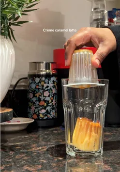 Delicious crème caramel latte served with a creamy texture and caramel drizzle in a cozy café setting.