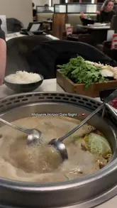 A short, handheld-style video documenting a midweek hotpot date night at Happy Lamb Hot Pot. The video features shots of the restaurant exterior, the digital ordering interface, and the hotpot cooking process.