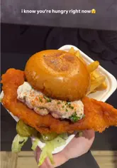 A fast-paced montage of various food items, including fried chicken, burgers, mac and cheese, and street food, likely showcasing a variety of options for Iftar during Ramadan.