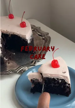 Fudgy chocolate cake topped with black cherry buttercream, featured in February's recipe on Substack by Dee's Basement.