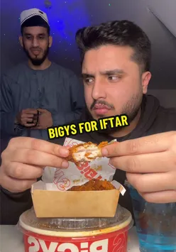 Group enjoying iftar at BiGYS during Ramadan, celebrating with traditional dishes and vibrant atmosphere.