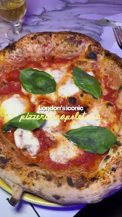 Contemporary Neapolitan pizza with a tall, light, airy, bubbly crust at Vasiniko London in Trafalgar Square & Covent Garden.