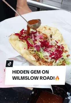 Exterior of D Fresh Restaurant on Wilmslow Road, Manchester, highlighting a cozy dining spot for food lovers.