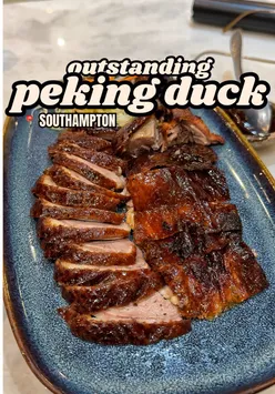 Sliced Peking duck with crispy skin, pancakes, and hoisin sauce served at 109 M Dim Sum restaurant in Southampton.