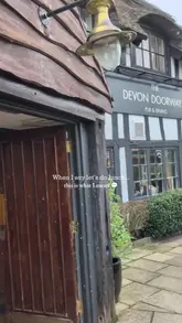 Diners enjoying seasonal food and drinks in the cosy, family-friendly atmosphere of The Devon Doorway country pub on the Wirral.