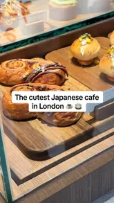 Aesthetic, flaky Japanese pastries and matcha drinks on display at a cute cafe bakery in Canary Wharf, London.