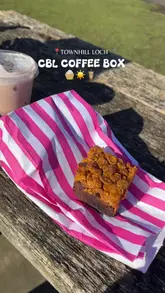 A short, aesthetic vlog showcasing a visit to CBL Coffee Box located by Townhill Loch. The video features the creator enjoying a coffee and various sweet treats like cupcakes, cookies, and brownies, set against a scenic lakeside backdrop.