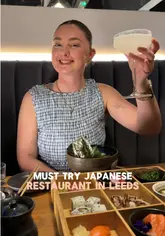 A group of friends visits TADA, a Japanese restaurant in Headingley, Leeds. The video features a tour of the interior, a look at the cocktail and food menus, and close-ups of various dishes including a sharing platter, bento box, ramen, and desserts.