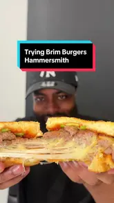 Smash burgers, Hot Smoked Sando, Chicken Run Burger, Blueberry Bliss drink, milkshake & brownie on a table at Brim Burgers.